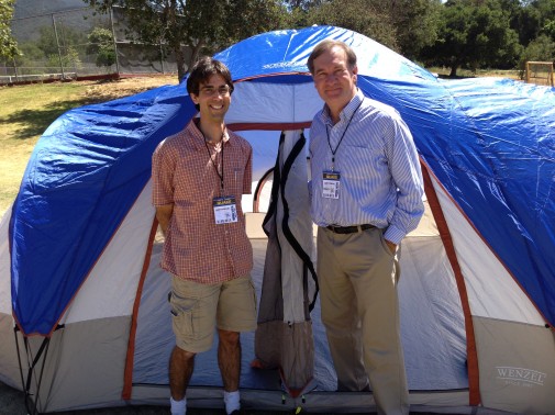 Neil Di Maggio, director of research, and Provost Mark Sargent proudly display their tent